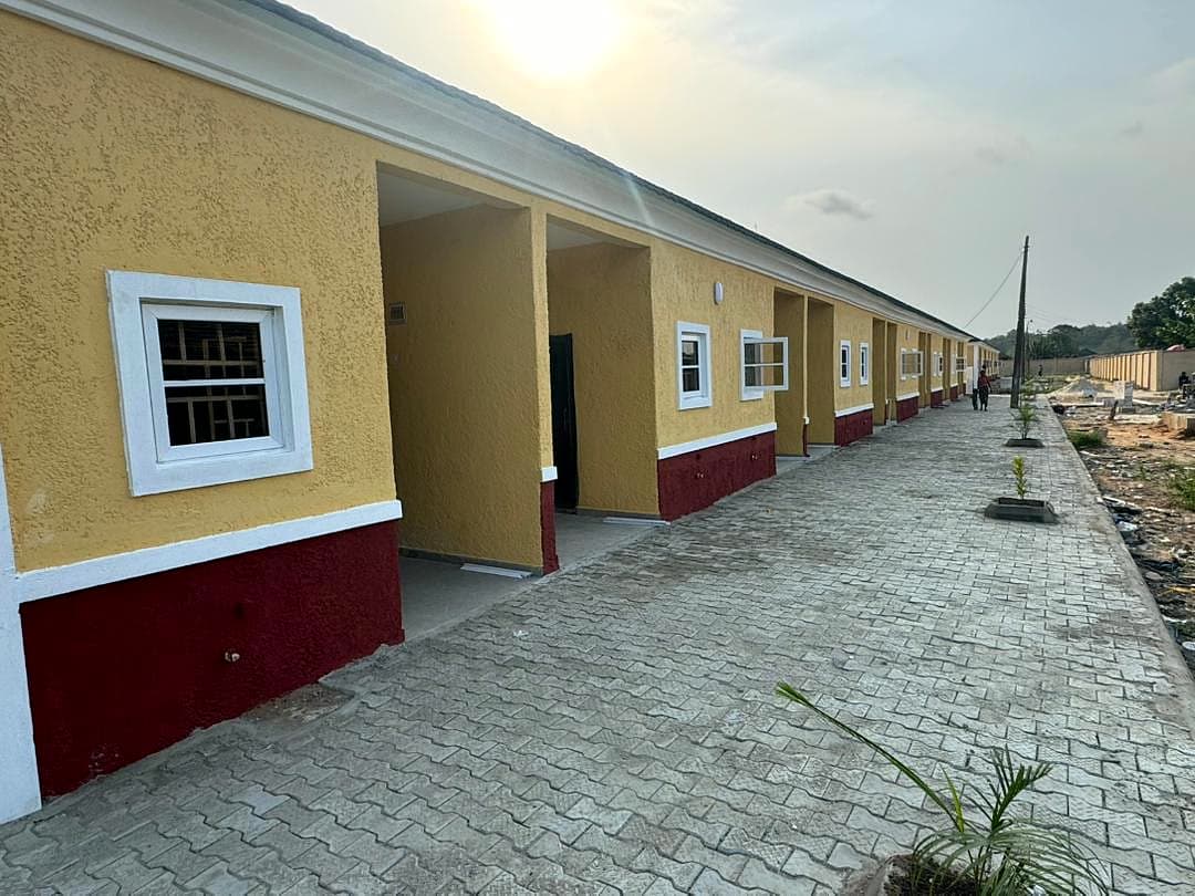 Completed terrace of mini-flats with paved walkway, Epe Cantonment