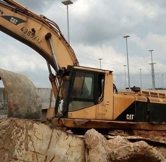 Tracked excavator working on site